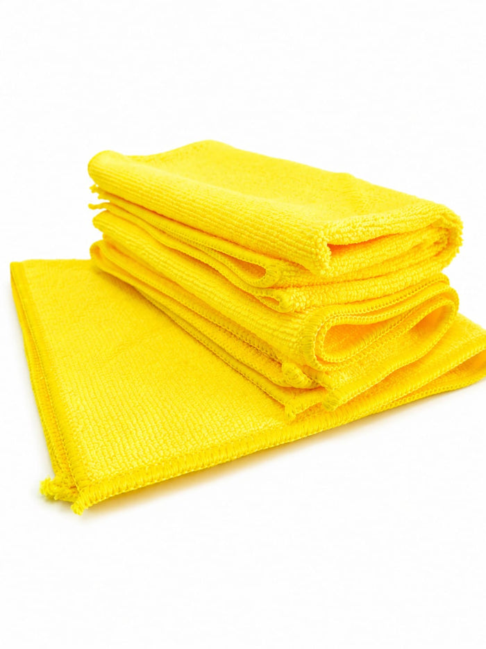 Bayetas de microfibra amarillas ECOPRODETAIL para detailing y limpieza del coche, dobladas y apiladas